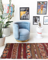 Vintage Turkish runner rug in a living room setting, pile rug, Turkish rug, vintage rug, portland, rug shop, bright colors, wild shaman, soft rug, bold color, Portland, Oregon, rug store, rug shop, local shop, antique rug