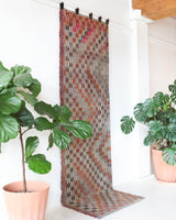 Vintage Turkish runner rug in living room setting, old rug, antique rug, pastel colors, faded colors, Turkish rug, vintage rug, soft rug, Portland, Oregon, rug store, rug shop, local shop