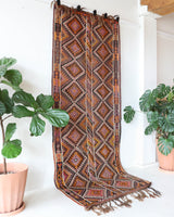 Vintage Turkish runner rug in a living room setting, pile rug, Turkish rug, vintage rug, portland, rug shop, bright colors, wild shaman, soft rug, bold color, Portland, Oregon, rug store, rug shop, local shop, antique rug