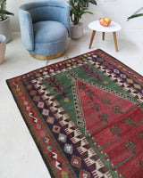 Vintage kilim rug in room decor setting, old rug, antique rug, pastel colors, faded colors, Turkish rug, vintage rug, soft rug, Portland, Oregon, rug store, rug shop, local shop, bold colors, bright colors, faded colors