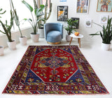 Vintage Turkish rug in a living room setting, pile rug, Turkish rug, vintage rug, portland, rug shop, bright colors, wild shaman, soft rug, bold color, Portland, Oregon, rug store, rug shop, local shop