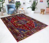 Vintage Turkish rug in a living room setting, pile rug, Turkish rug, vintage rug, portland, rug shop, bright colors, wild shaman, soft rug, bold color, Portland, Oregon, rug store, rug shop, local shop