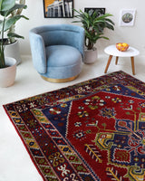 Vintage Turkish rug in a living room setting, pile rug, Turkish rug, vintage rug, portland, rug shop, bright colors, wild shaman, soft rug, bold color, Portland, Oregon, rug store, rug shop, local shop