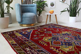 Vintage Turkish rug in a living room setting, pile rug, Turkish rug, vintage rug, portland, rug shop, bright colors, wild shaman, soft rug, bold color, Portland, Oregon, rug store, rug shop, local shop