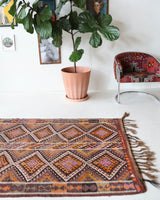 Vintage Turkish runner rug in a living room setting, pile rug, Turkish rug, vintage rug, portland, rug shop, bright colors, wild shaman, soft rug, bold color, Portland, Oregon, rug store, rug shop, local shop, antique rug