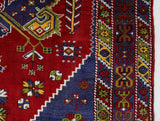 Vintage Turkish rug in a living room setting, pile rug, Turkish rug, vintage rug, portland, rug shop, bright colors, wild shaman, soft rug, bold color, Portland, Oregon, rug store, rug shop, local shop