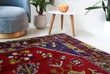 Vintage Turkish rug in a living room setting, pile rug, Turkish rug, vintage rug, portland, rug shop, bright colors, wild shaman, soft rug, bold color, Portland, Oregon, rug store, rug shop, local shop