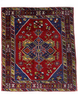 Vintage Turkish rug in a living room setting, pile rug, Turkish rug, vintage rug, portland, rug shop, bright colors, wild shaman, soft rug, bold color, Portland, Oregon, rug store, rug shop, local shop
