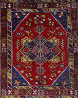 Vintage Turkish rug in a living room setting, pile rug, Turkish rug, vintage rug, portland, rug shop, bright colors, wild shaman, soft rug, bold color, Portland, Oregon, rug store, rug shop, local shop