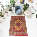 Vintage Turkish rug in living room setting, old rug, antique rug, pastel colors, faded colors, Turkish rug, vintage rug, soft rug, Portland, Oregon, rug store, rug shop, local shop
