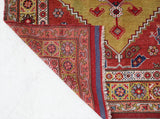 Vintage Turkish rug in living room setting, old rug, antique rug, pastel colors, faded colors, Turkish rug, vintage rug, soft rug, Portland, Oregon, rug store, rug shop, local shop