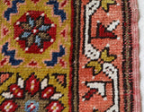 Vintage Turkish rug in living room setting, old rug, antique rug, pastel colors, faded colors, Turkish rug, vintage rug, soft rug, Portland, Oregon, rug store, rug shop, local shop