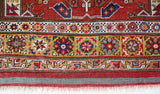 Vintage Turkish rug in living room setting, old rug, antique rug, pastel colors, faded colors, Turkish rug, vintage rug, soft rug, Portland, Oregon, rug store, rug shop, local shop