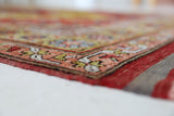 Vintage Turkish rug in living room setting, old rug, antique rug, pastel colors, faded colors, Turkish rug, vintage rug, soft rug, Portland, Oregon, rug store, rug shop, local shop