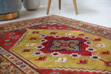 Vintage Turkish rug in living room setting, old rug, antique rug, pastel colors, faded colors, Turkish rug, vintage rug, soft rug, Portland, Oregon, rug store, rug shop, local shop