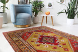 Vintage Turkish rug in living room setting, old rug, antique rug, pastel colors, faded colors, Turkish rug, vintage rug, soft rug, Portland, Oregon, rug store, rug shop, local shop