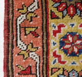 Vintage Turkish rug in living room setting, old rug, antique rug, pastel colors, faded colors, Turkish rug, vintage rug, soft rug, Portland, Oregon, rug store, rug shop, local shop