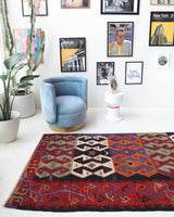 Vintage kilim rug in living room setting, bright colors, wild shaman, soft rug, bold color, Portland, Oregon, rug store, rug shop, local shop, vintage rug, modern kilim, warm colors