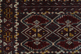 Turkmen rug in a living room setting, pile rug, Turkish rug, vintage rug, portland, rug shop, bright colors, wild shaman, soft rug, bold color, Portland, Oregon, rug store, rug shop, local shop, antique rug
