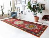 Vintage kilim rug in living room setting, bright colors, wild shaman, soft rug, bold color, Portland, Oregon, rug store, rug shop, local shop, vintage rug, modern kilim, warm colors