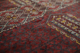 Turkmen rug in a living room setting, pile rug, Turkish rug, vintage rug, portland, rug shop, bright colors, wild shaman, soft rug, bold color, Portland, Oregon, rug store, rug shop, local shop, antique rug