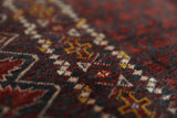 Turkmen rug in a living room setting, pile rug, Turkish rug, vintage rug, portland, rug shop, bright colors, wild shaman, soft rug, bold color, Portland, Oregon, rug store, rug shop, local shop, antique rug