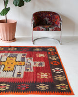 Vintage kilim rug in living room setting, bright colors, wild shaman, soft rug, bold color, Portland, Oregon, rug store, rug shop, local shop, vintage rug, modern kilim, warm colors