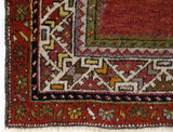 Turkish rug in a living room setting, pile rug, Turkish rug, vintage rug, portland, rug shop, bright colors, wild shaman, soft rug, bold color, Portland, Oregon, rug store, rug shop, local shop, antique rug