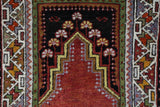 Turkish rug in a living room setting, pile rug, Turkish rug, vintage rug, portland, rug shop, bright colors, wild shaman, soft rug, bold color, Portland, Oregon, rug store, rug shop, local shop, antique rug