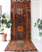 Vintage kilim rug in living room setting, bright colors, wild shaman, soft rug, bold color, Portland, Oregon, rug store, rug shop, local shop, vintage rug, modern kilim, warm colors