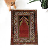 Turkish rug in a living room setting, pile rug, Turkish rug, vintage rug, portland, rug shop, bright colors, wild shaman, soft rug, bold color, Portland, Oregon, rug store, rug shop, local shop, antique rug