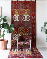 Vintage kilim rug in living room setting, bright colors, wild shaman, soft rug, bold color, Portland, Oregon, rug store, rug shop, local shop, vintage rug, modern kilim, warm colors