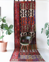 Vintage kilim rug in living room setting, bright colors, wild shaman, soft rug, bold color, Portland, Oregon, rug store, rug shop, local shop, vintage rug, modern kilim, warm colors