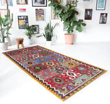 Vintage kilim rug in living room setting, bright colors, wild shaman, soft rug, bold color, Portland, Oregon, rug store, rug shop, local shop, vintage rug, modern kilim, warm colors