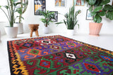 Vintage kilim rug in living room setting, bright colors, wild shaman, soft rug, bold color, Portland, Oregon, rug store, rug shop, local shop, vintage rug, modern kilim, warm colors