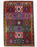 Vintage kilim rug in living room setting, bright colors, wild shaman, soft rug, bold color, Portland, Oregon, rug store, rug shop, local shop, vintage rug, modern kilim, warm colors