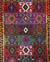 Vintage kilim rug in living room setting, bright colors, wild shaman, soft rug, bold color, Portland, Oregon, rug store, rug shop, local shop, vintage rug, modern kilim, warm colors