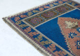 Vintage mini kilim rug in room decor setting, kilim, Turkish rug, vintage rug, portland, rug shop, bright colors, wild shaman, soft rug, bold color, Portland, Oregon, rug store, rug shop, local shop