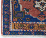 Vintage mini kilim rug in room decor setting, kilim, Turkish rug, vintage rug, portland, rug shop, bright colors, wild shaman, soft rug, bold color, Portland, Oregon, rug store, rug shop, local shop