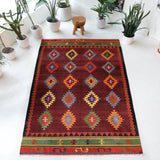 Vintage kilim rug in living room setting, bright colors, wild shaman, soft rug, bold color, Portland, Oregon, rug store, rug shop, local shop, vintage rug, modern kilim, warm colors