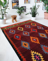 Vintage kilim rug in living room setting, bright colors, wild shaman, soft rug, bold color, Portland, Oregon, rug store, rug shop, local shop, vintage rug, modern kilim, warm colors