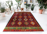 Vintage kilim rug in living room setting, bright colors, wild shaman, soft rug, bold color, Portland, Oregon, rug store, rug shop, local shop, vintage rug, modern kilim, warm colors