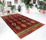 Vintage kilim rug in living room setting, bright colors, wild shaman, soft rug, bold color, Portland, Oregon, rug store, rug shop, local shop, vintage rug, modern kilim, warm colors