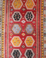 Vintage kilim rug in room decor setting, old rug, antique rug, pastel colors, faded colors, Turkish rug, vintage rug, soft rug, Portland, Oregon, rug store, rug shop, local shop, bold colors, bright colors, faded colors