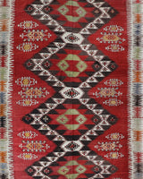 Vintage kilim rug in living room setting, old rug, antique rug, pastel colors, faded colors, Turkish rug, vintage rug, soft rug, Portland, Oregon, rug store, rug shop, local shop, earthy tones, earthy colors, warm colors