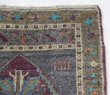Vintage Turkish mini rug in room decor setting, old rug, antique rug, pastel colors, faded colors, Turkish rug, vintage rug, soft rug, Portland, Oregon, rug store, rug shop, local shop,  bright colors, bold colors