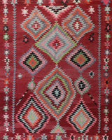 Vintage kilim rug in living room setting, old rug, antique rug, pastel colors, faded colors, Turkish rug, vintage rug, soft rug, Portland, Oregon, rug store, rug shop, local shop, earthy tones, earthy colors, warm colors