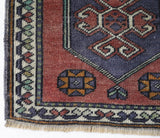 Vintage Turkish mini rug in room decor setting, old rug, antique rug, pastel colors, faded colors, Turkish rug, vintage rug, soft rug, Portland, Oregon, rug store, rug shop, local shop,  bright colors, bold colors