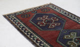 Vintage Turkish mini rug in room decor setting, old rug, antique rug, pastel colors, faded colors, Turkish rug, vintage rug, soft rug, Portland, Oregon, rug store, rug shop, local shop,  bright colors, bold colors
