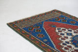 Vintage mini kilim rug in room decor setting, kilim, Turkish rug, vintage rug, portland, rug shop, bright colors, wild shaman, soft rug, bold color, Portland, Oregon, rug store, rug shop, local shop